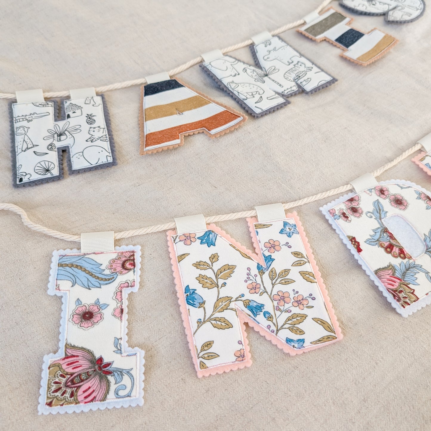 Keepsake Name Bunting – Your Baby’s Outgrown Clothes, Transformed into a Treasured Display