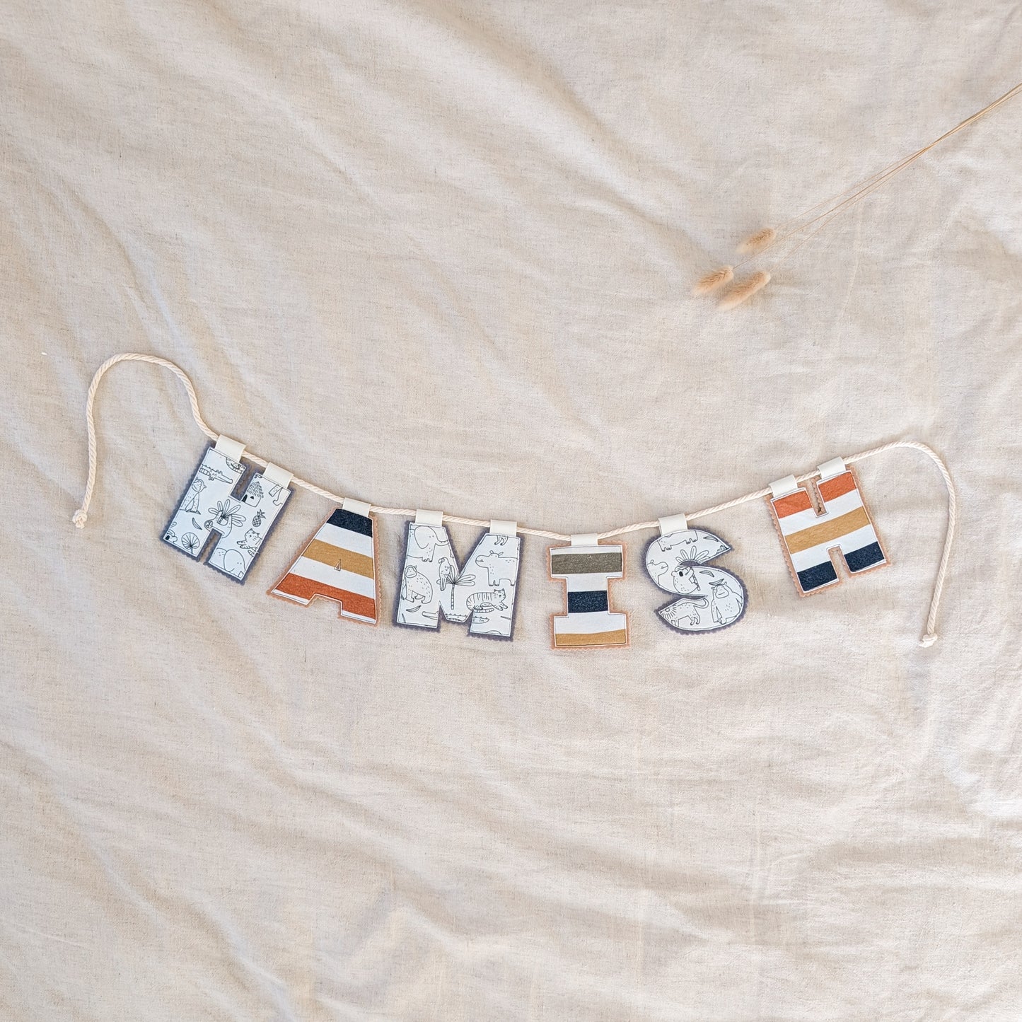 Keepsake Name Bunting – Your Baby’s Outgrown Clothes, Transformed into a Treasured Display